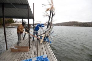 Installing artificial PVC fish habitat at the Lake of the Ozarks